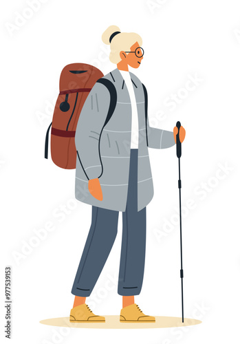 Hiker woman with backpack trekking outdoors wearing glasses holding walking stick winter clothing