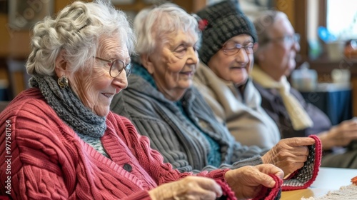 Elderly residents participating in a knitting circle at a community center photo