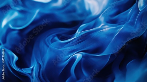 A blue abstract background with flowing shapes and patterns, creating a dynamic and artistic visual effect.