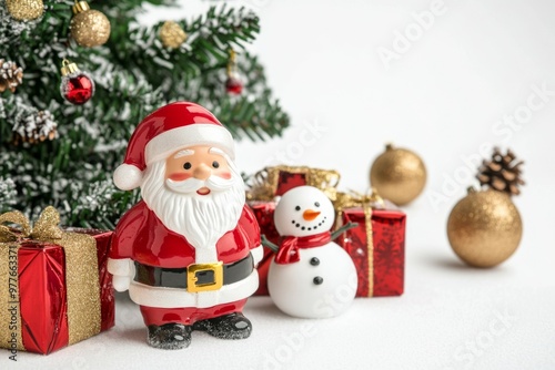 Christmas decorations, a Christmas tree, presents, and a Santa Claus figurine with a snowman on a white background. 