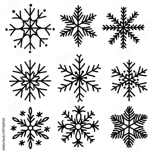 Doodle set of hand drawn snowflakes. Charcoal pen drawn christmas and new year decoration. Vector chalk graphic elements