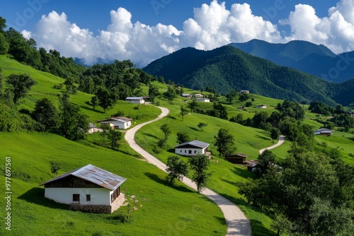 Authentic rural landscape stretches across rolling hills and traditional homes, untouched by modernity photo