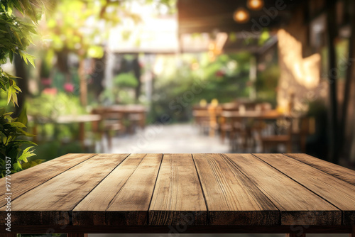 Empty wood table with blur interior outdoor space coffee restaurant or cafe for background