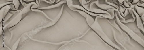 Elegant drapery of delicate beige fabric.