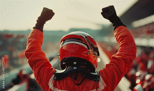 professional formula 1 racing driver pilot in red uniform and helmet celebrating victory, motorsport winner celebrate photo