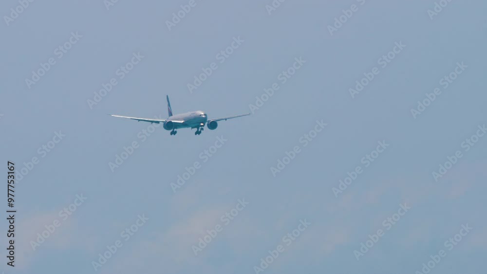 Widebody airplane approaching before landing at Adler airport, long shot. Travel concept Widebody airplane approaching before landing at Adler airport, long shot. Travel concept
