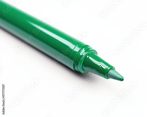 Green Marker Close-Up on a White Background. Macro Shot of Isolated Pen for Hobby Painting photo