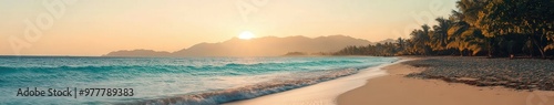 Tropical beach at dusk with gentle waves and vibrant sunset colors