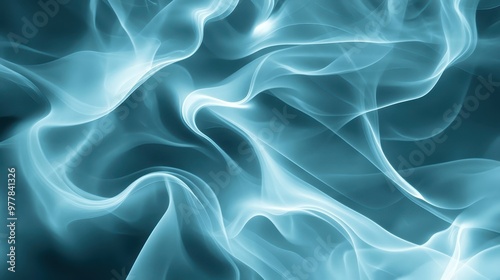 Abstract blue smoke swirls with soft lighting creating a tranquil and mystical atmosphere.