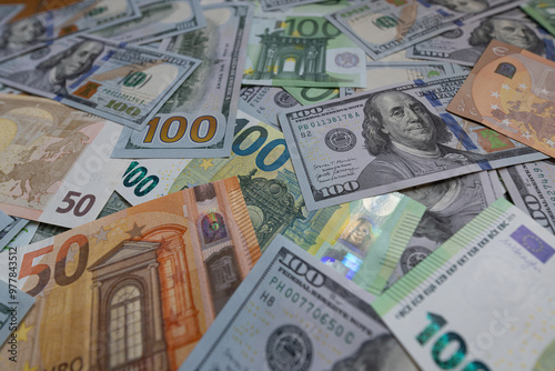 US dollar and euro banknotes background photo