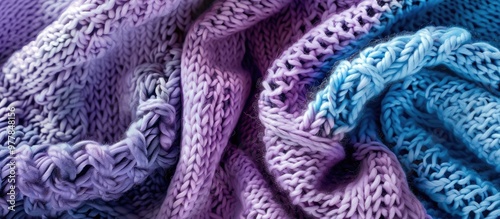 Two knitted fabrics in lilac and blue Close up of a knitted blanket Abstract minimalist knitted backdrop Copy space photo