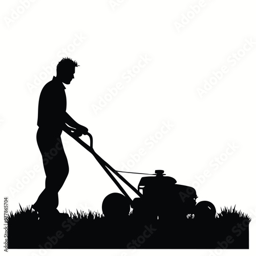 Silhouette of a Young Man Mowing the Lawn: A Simple Outdoor Scene