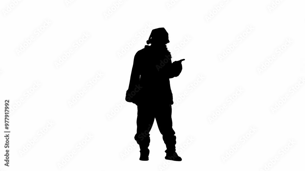 Christmas and New Year holidays concept. Black silhouette of a man in Santa Claus costume on white isolated background. Santa Claus is pointing with index finger to the side, advertising something Christmas and New Year holidays concept. Black silhouette of a man in Santa Claus costume on white isolated background. Santa Claus is pointing with index finger to the side, advertising something