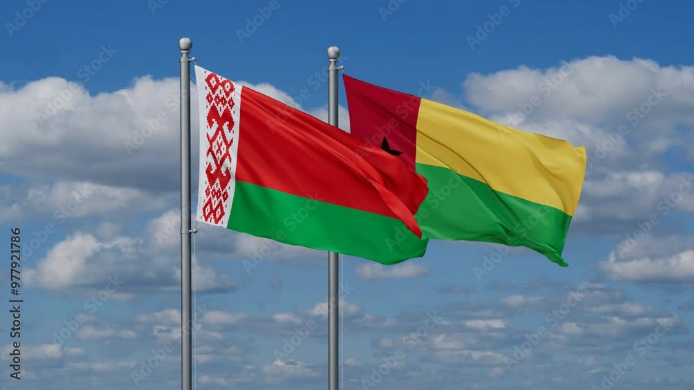 Guinea-Bissau and Belarus flags flying together, video concept of the relationship, two country relations concept Guinea-Bissau and Belarus flags flying together, video concept of the relationship, two country relations concept