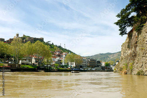 georgian old tbilisi town panoramic aerial view through mtkvari river photo