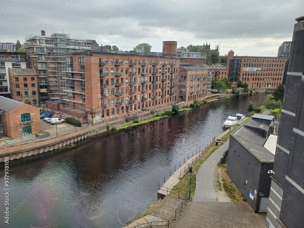 Obraz premium Water canals in Leeds, canal, Yorkshire, city, uk, summer 2024, view from armoury museum, boats, red brick, buildings, dock