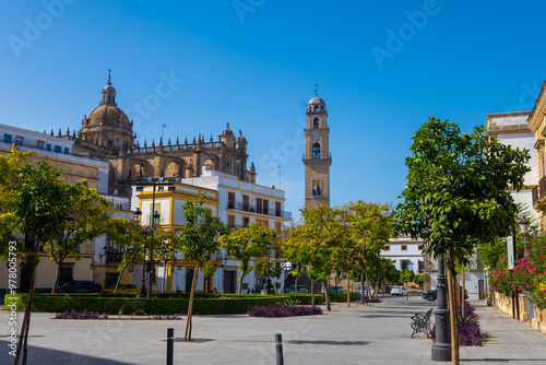 Walking in old part of Jerez de la Frontera, Sherry wine making town, Andalusia, Spain in summer, architectural details, Andalusian style, churches and towers photo