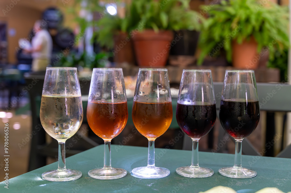 Flight of five sherry wine from barrels, fino, manzanilla, olorosso, amontillado, pedro ximenez jerez wines in old tavern, wine tasting, Sanlucar de Barrameda, Cadiz, Andalusia, Spain Flight of five sherry wine from barrels, fino, manzanilla, olorosso, amontillado, pedro ximenez jerez wines in old tavern, wine tasting, Sanlucar de Barrameda, Cadiz, Andalusia, Spain