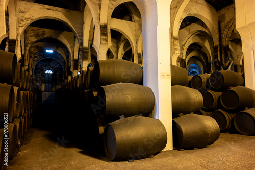 Solera system in bodegas, Andalusian wine cellar, process for aging different sherry wine in barrels, producing of jerez fortified wine, Jerez de la Frontera, Andalusia, Spain photo