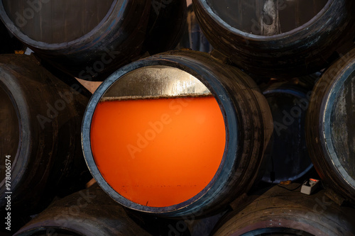 Flor, film of yeast in solera system in old Andalusian wine cellar, process for aging sherry wine in barrels, jerez fortified wine, Sanlucar de Barrameda, Cadiz, Andalusia, Spain