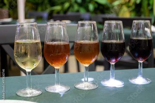 Flight of five sherry wine from barrels, fino, manzanilla, olorosso, amontillado, pedro ximenez jerez wines in old tavern, wine tasting, Sanlucar de Barrameda, Cadiz, Andalusia, Spain