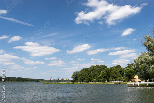 Obraz na płótnie Summer landscape at Quay of Jezioro Berzyńskie lake in Wolsztyn, Greater Poland (Wielkopolska) covered in flowers. w salonie