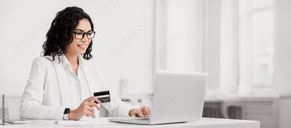 Fundraising. Smiling hispanic woman making donation, becoming a volunteer, using credit card and laptop, copyspace Fundraising. Smiling hispanic woman making donation, becoming a volunteer, using credit card and laptop, copyspace