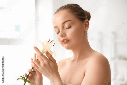 Beautiful young woman with ...