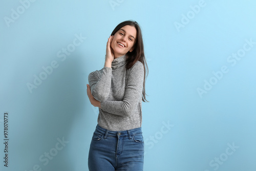 Body positive woman on blue...