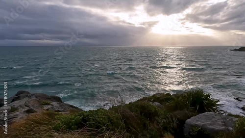 Bluff Hill Motupohue, scenic views over Foveaux Strait coast and scrub-covered hillsides in Southland, New Zealand photo