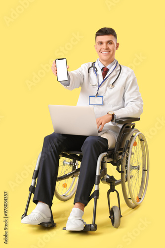 Young male doctor in wheelc...