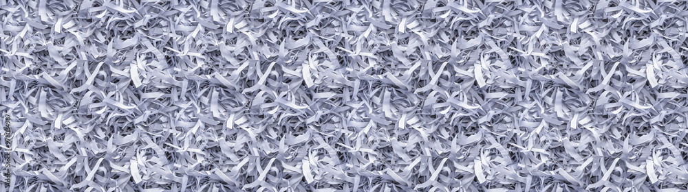 shredded paper filler in light gray color with thin, delicate strips, shredded paper filler texture background shredded paper filler in light gray color with thin, delicate strips, shredded paper filler texture background