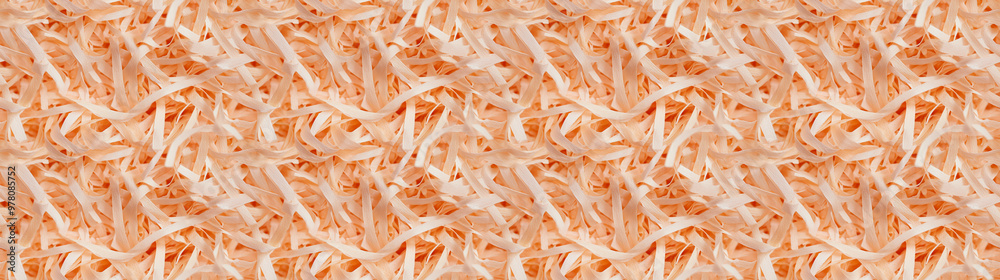 Fototapeta premium shredded paper filler in orange color with thin, delicate strips, shredded paper filler texture background