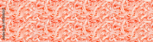 shredded paper filler in salmon pink color with thin, delicate strips, shredded paper filler texture background photo