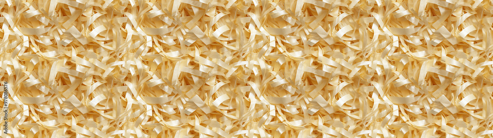 shredded paper filler in soft gold color with thin, delicate strips, shredded paper filler texture background shredded paper filler in soft gold color with thin, delicate strips, shredded paper filler texture background