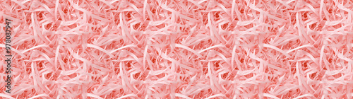 shredded paper filler inamber color with thin, delicate strips, shredded paper filler texture background photo