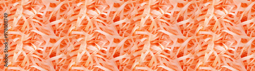 shredded paper filler inapricot color with thin, delicate strips, shredded paper filler texture background photo