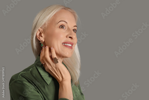 Fashionable mature woman in...