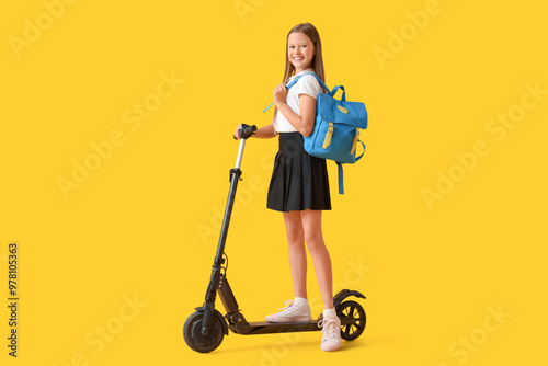 Cute schoolgirl with electr...
