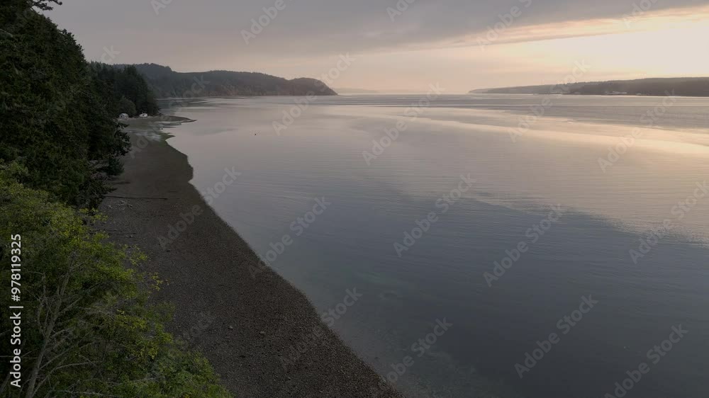 Morning drone shot of sunrise over Hood Canal water Morning drone shot of sunrise over Hood Canal water
