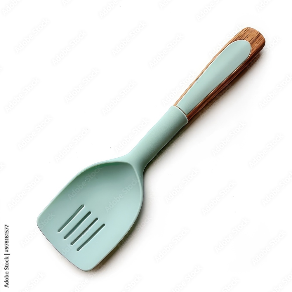 The green silicone spatula with wooden handle kitchen cooking and baking utensil for food cuisine and culinary tool for domestic and restaurant kitchens The green silicone spatula with wooden handle kitchen cooking and baking utensil for food cuisine and culinary tool for domestic and restaurant kitchens