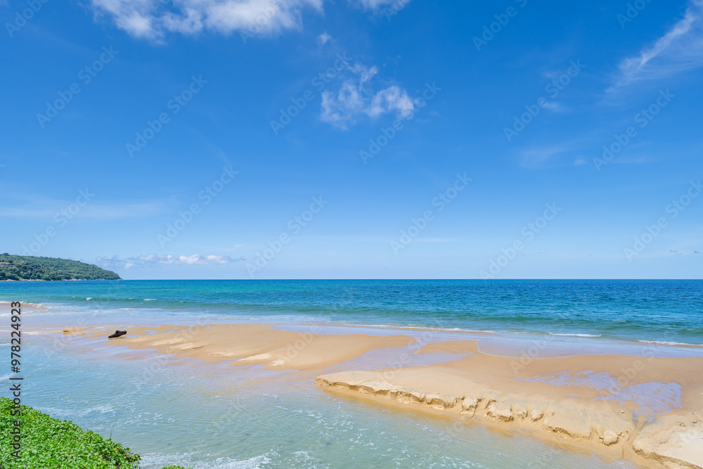 Fototapeta premium Beautiful tropical beach summer seascape,Amazing sandy beach and sea in sunny day,Blue sky in good weather day, Beach sea space area nature background