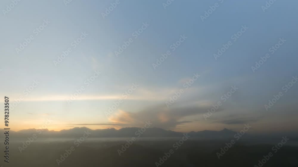 Time lapse beautiful clouds floating by the sky above mountains in sunny day. Time lapse beautiful clouds floating by the sky above mountains in sunny day.