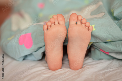 baby feet in bed