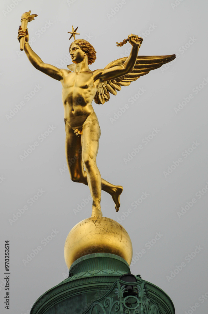 Fototapeta premium Paris, Ille de France, France. September 16, 2024: Golden statue of Winged Liberty on top of the July Column in Paris, France