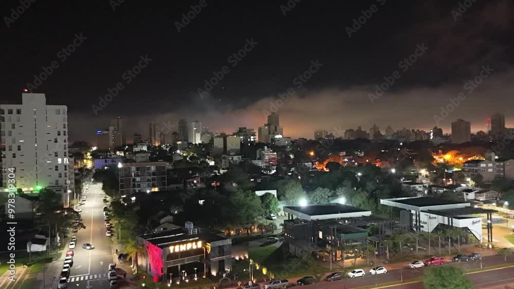 A city at night with lights from streets and buildings piercing through the darkness. The clouds add a layer of mystery to the urban landscape.
HYPERLAPSE 4K. A city at night with lights from streets and buildings piercing through the darkness. The clouds add a layer of mystery to the urban landscape.
HYPERLAPSE 4K.