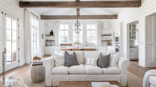 A blend of rustic charm and modern design, with shiplap walls, exposed wood beams, neutral colors, and cozy, functional furniture. Modern American Farmhouse living room interior design 