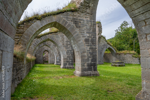 Close-up of intricate stone details at Alvastra Monastery ruins. Showcase the craftsmanship and age of this historic site. Ideal for architecture, history, and cultural projects. photo