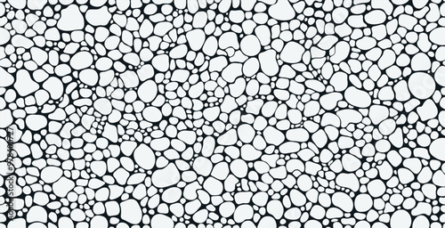 Seamless black and white stone wall background.