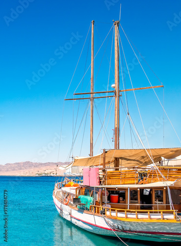Marina with moored yachts and pleasured boats at the tourist resort located o...